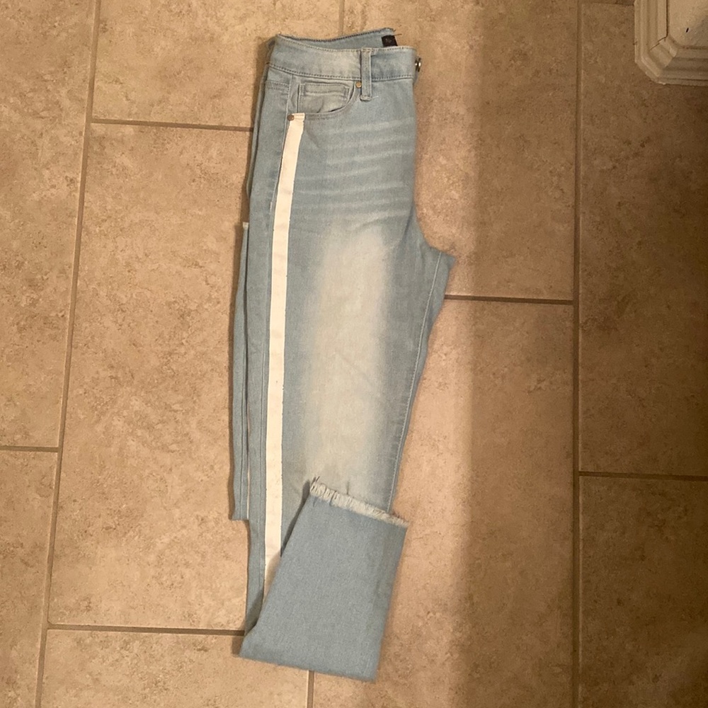 Light blue jeans with white stripe on the sides